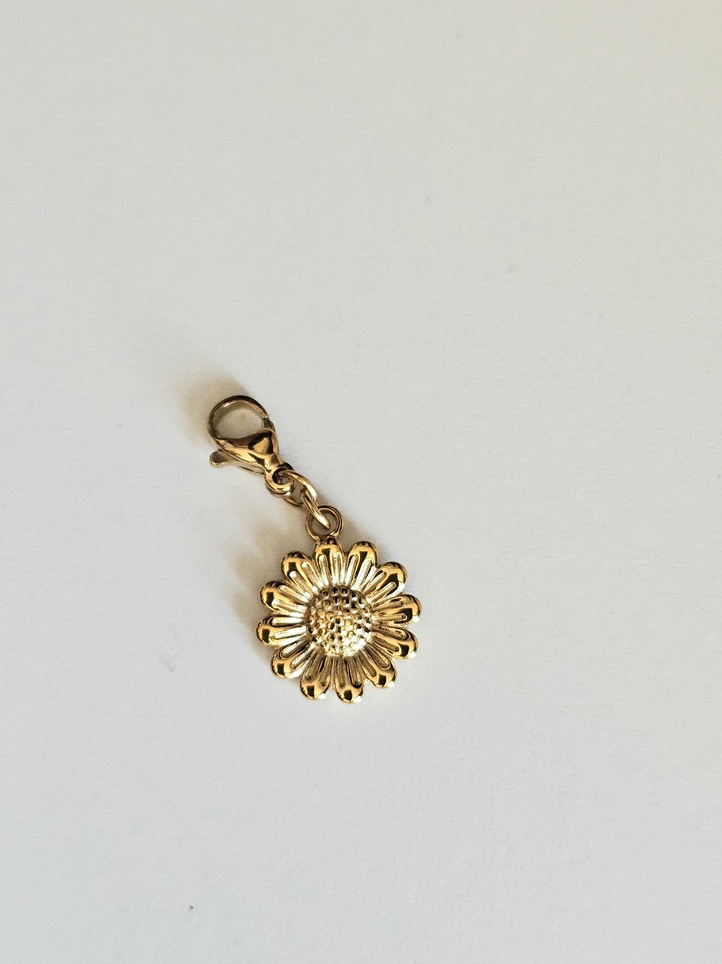 Charms fleur doré